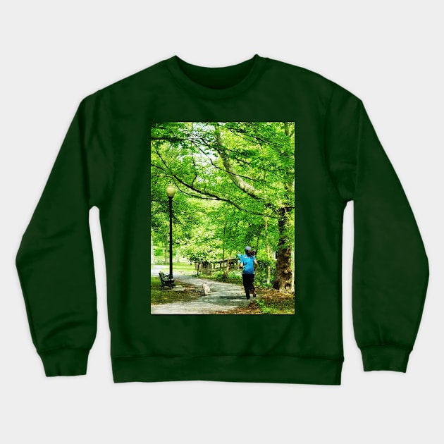 Jogging - Girl Jogging With Dog Crewneck Sweatshirt by SusanSavad